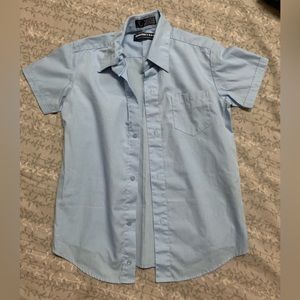 Boys button down shirt for special occasions. Light blue, collard shirt sleeve.